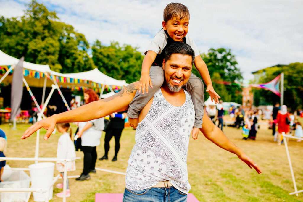 Father and Son enjoying Tahawai Festival